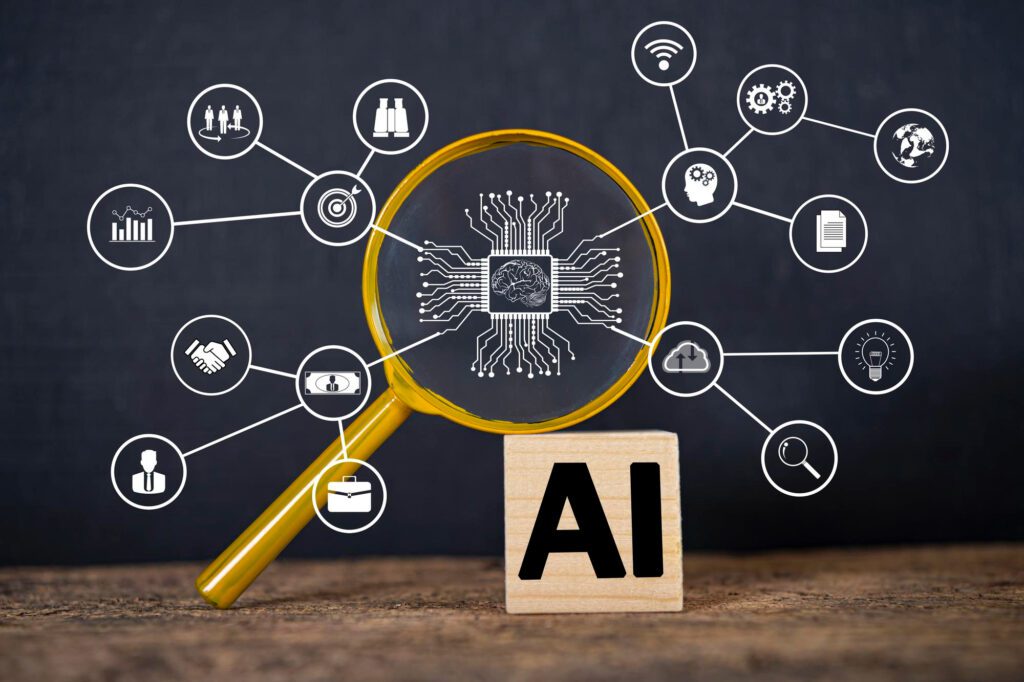 A magnifying glass focusing on a digital circuit with a brain symbol, representing artificial intelligence. Surrounding it are interconnected icons symbolizing AI applications such as data analysis, cloud computing, finance, business, and innovation. A wooden block with "AI" written on it is placed below.